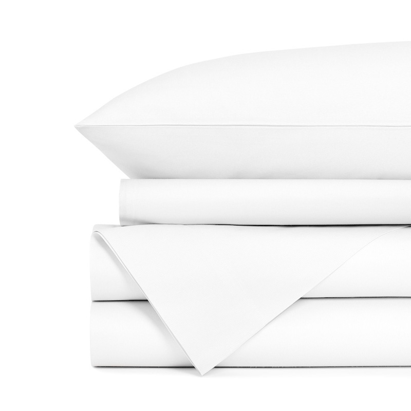 Best luxury sheets for Airbnbs - Centium Satin by Standard Textile, designed for high-end vacation rentals. class=
